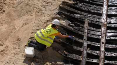 Archaeologists uncovered a 15th-century ship beneath Barcelona during car park construction; its wooden hull had around 30 ribs
