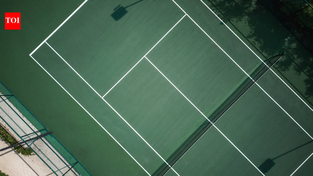 Former Starbucks boss ordered to remove illegal tennis court from Hampshire land