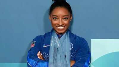 Simone Biles reacts after Michelle Obama names her among the greatest athletes in her Mount Rushmore of sports GOATs: "Mrs. Michelle Obama, you..."