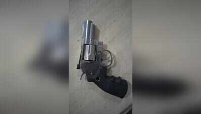 Liquor trader held for brandishing unlicenced revolver at bar