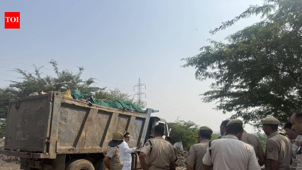 Second time in a week, cops detain protesters to make way for trash trucks