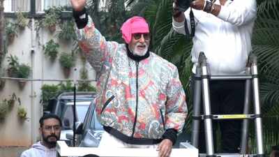 Amid bomb threat email and health concerns, Amitabh Bachchan greets fans outside Jalsa, protective son Abhishek Bachchan joins his father