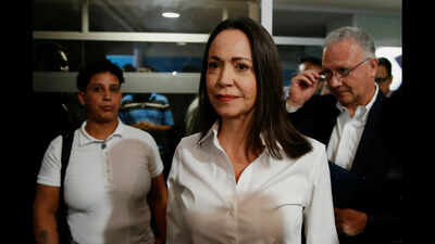 'I am here. With you': Maria Corina Machado returns to Venezuela from exile