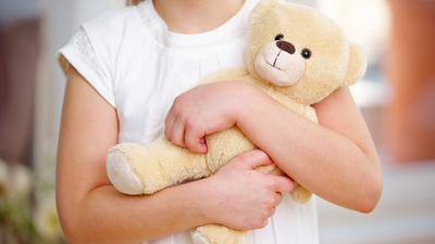Psychology says children who carry the same toy from room to room may be seeking more than entertainment