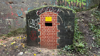 Britain converted a nearly 200-year-old railway worker's hut into a bat shelter; a winter inspection found a whiskered bat hibernating inside
