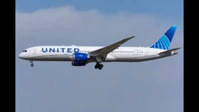 United Airlines flight returns to Las Vegas after flight attendant finds passenger texting about 'hijacking'; 150 passengers stranded overnight