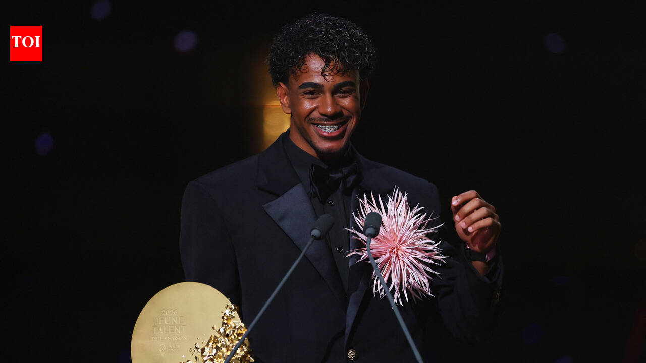 Lamine Yamal celebrates after winning the Kopa Trophy