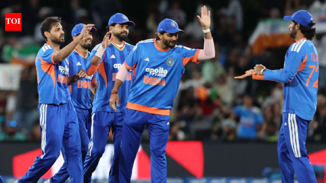 India's T20I side celebrate after beating New Zealand in Christchurch