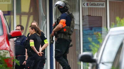 BMW crashes into group in Germany's Hanover, police launch hunt after suspects flee