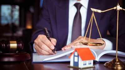 In 2005, a Maine husband refinanced the family home without his wife's signature; after their divorce and years without payments, a faulty $189,471 foreclosure notice helped her win in federal court