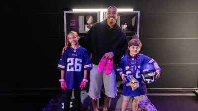 Justin Jefferson's charity bowling night raised over $45,000 for cancer research; the Vikings star also surprised 7-year-old fan Claire Van Epps, who is undergoing treatment, with Super Bowl tickets