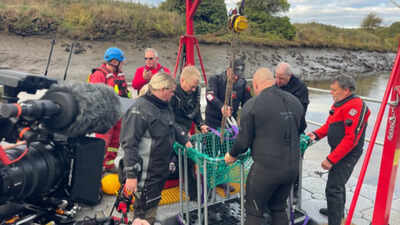 A diver searching the bottom of England’s River Wear has pulled up a huge three-legged iron cauldron that lay hidden underwater for hundreds of years, and researchers are still trying to work out how it got there
