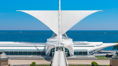 A Wisconsin family commits $10 million to preserve a museum building famous for its giant moving wings overlooking Lake Michigan, ensuring the 25-year-old architectural landmark survives for future generations