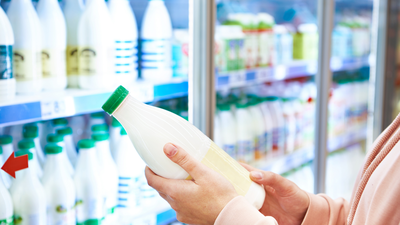 Why do supermarkets put milk at the back of the store?