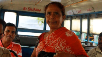 "I went through a lot of pain.." Her father had a dream for her at 59, Howrah’s Dolly Rana became a conductor to save the bus she bought to fulfil her late father’s dream