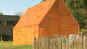 Energy efficient house made of wood, encased in copper