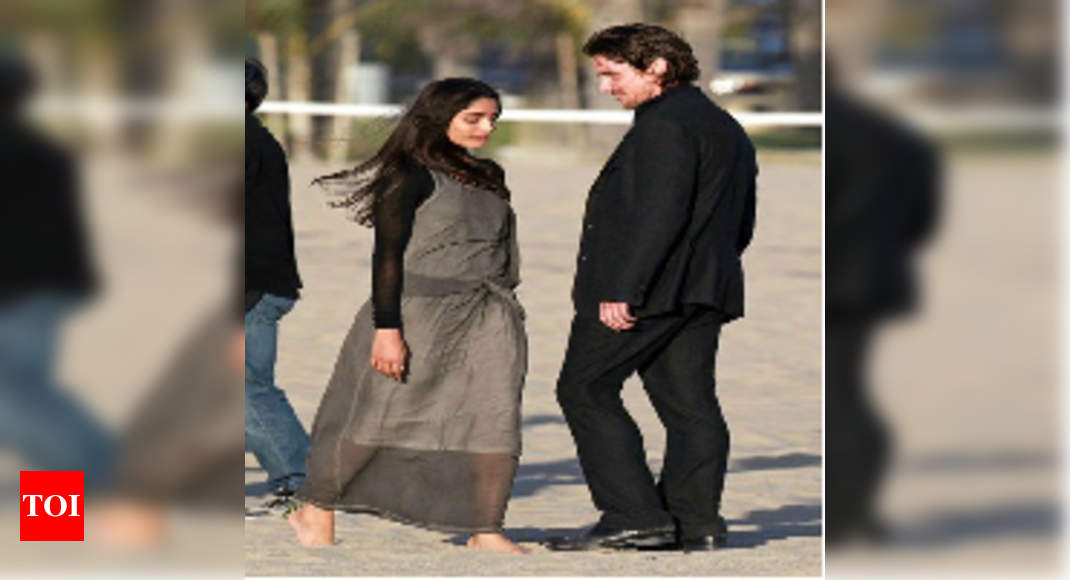 Christian Bale Romances Freida Pinto On A Beach English Movie News Times Of India