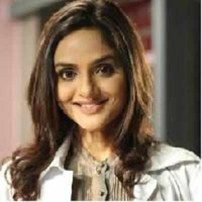 Madhoo faces camera yet again for Tomchi