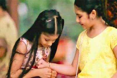 Now, sisters too tie each other a rakhi - Times of India