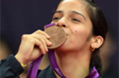 PM, Sonia Gandhi congratulate Saina for bronze at Olympics