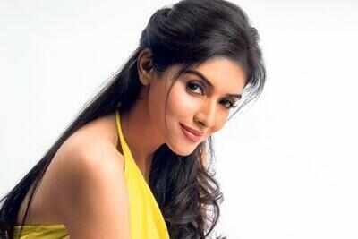 Gautham Menon teams up with Asin