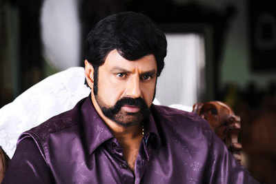 Balakrishna fans protest at a theatre
