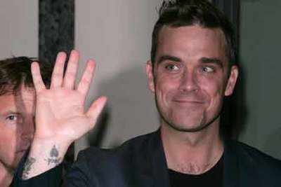 Robbie Williams can’t fit in his clothes anymore