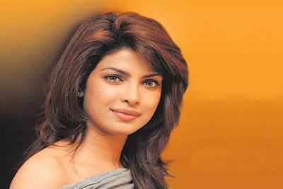 Priyanka Chopra slays in plunging neckline monochrome Kaushik Velendra  powersuit : Bollywood News - Bollywood Hungama