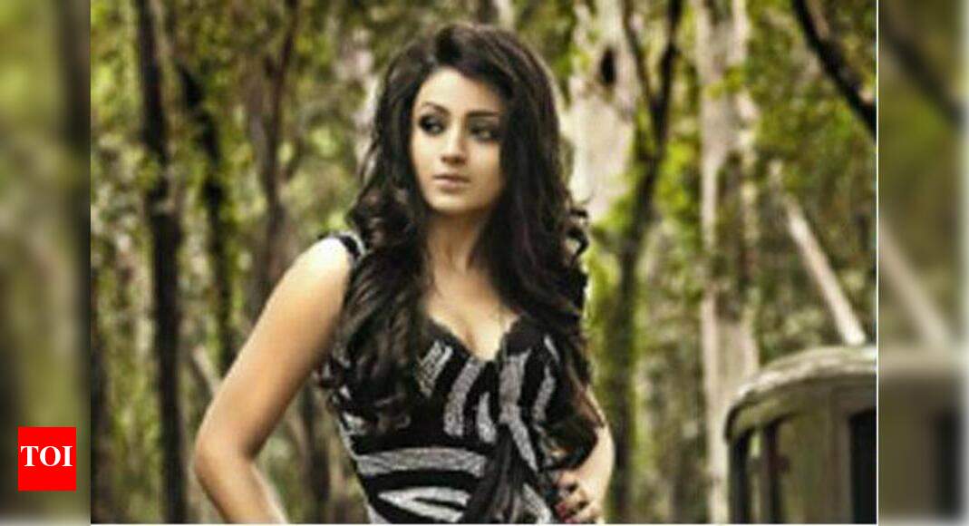 Trisha teaches Ravi to box | Tamil Movie News - Times of India