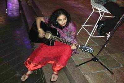 Nithya Menen spotted playing Guitar