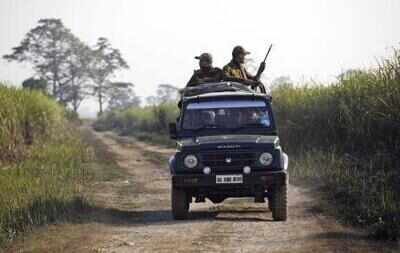 Forest guards with WW II rifles losing fight against poachers with submachine guns