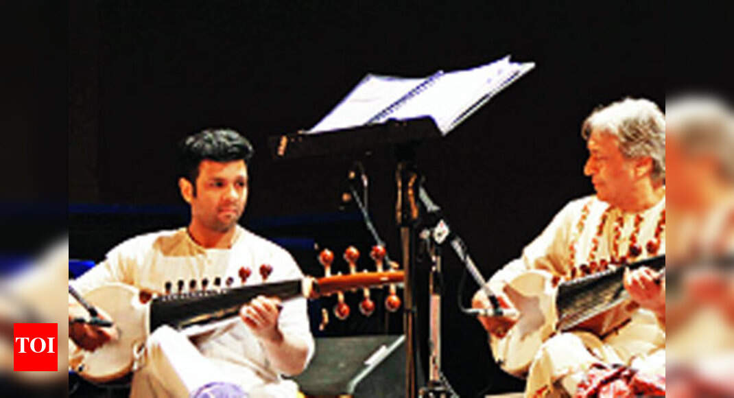 Sarod maestro Ustad Amjad Ali Khan performs with his sons in Ahmedabad