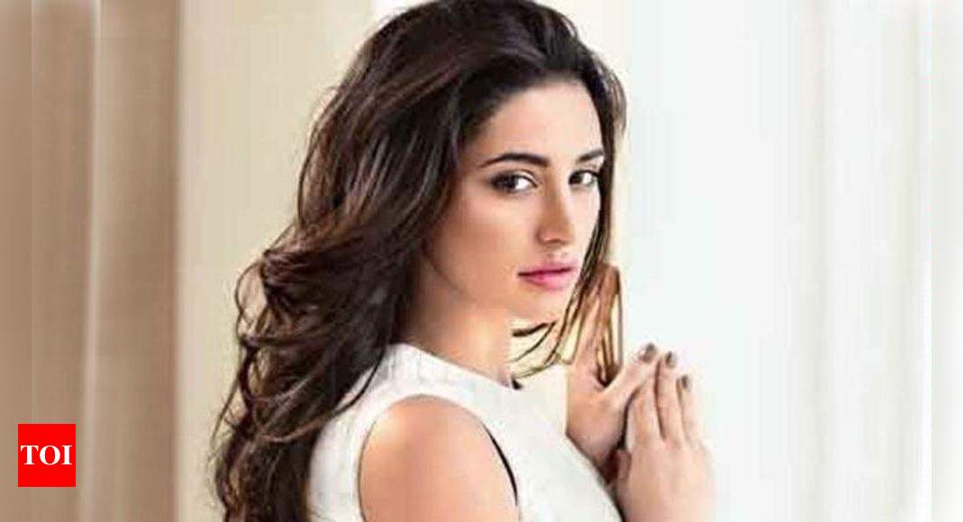 It was tough playing a journalist on screen: Nargis Fakhri | Hindi Movie  News - Times of India