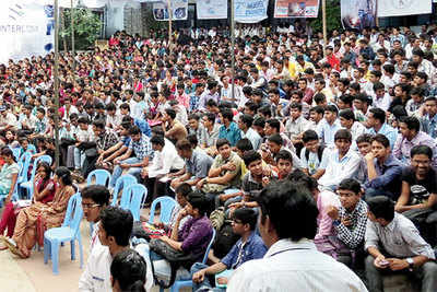 Students attend 'Abhigyan 2013' organised by the Walk With World (WWW) committee of KIT College in Kolhapur