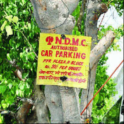‘Take your ads off trees or face legal action’