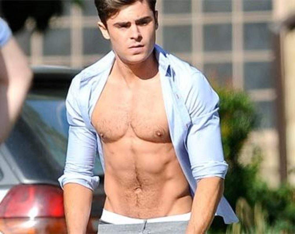
Shirtless Zac Efron shows off abs on the sets of 'Townies'
