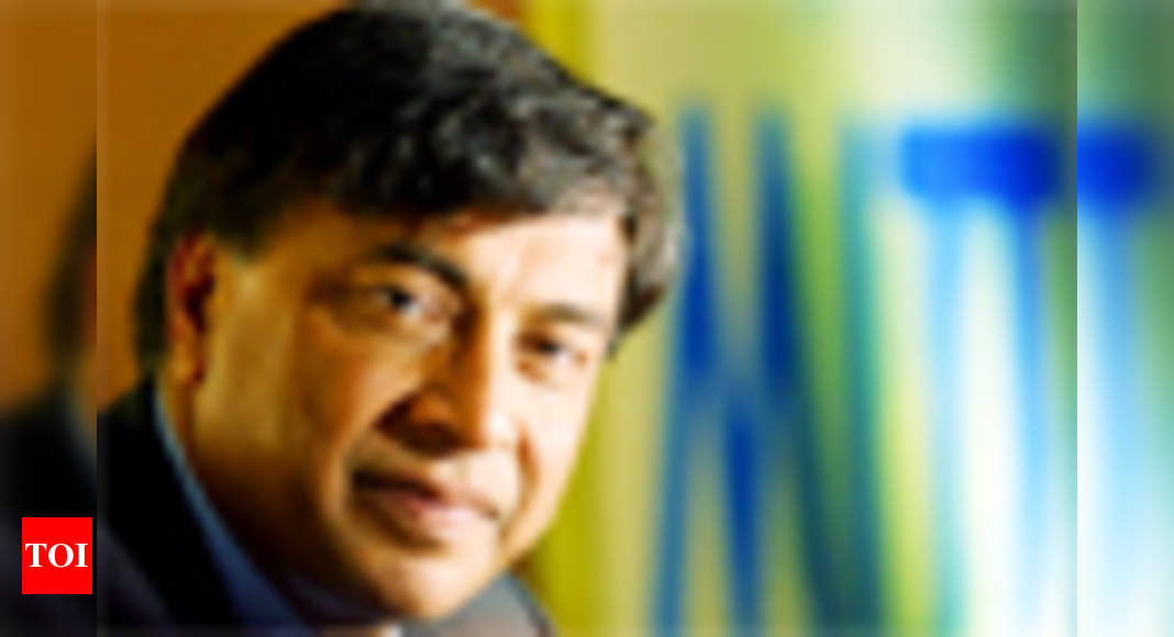 Lakshmi Mittal passes the steel baton to son Aditya - Times of India