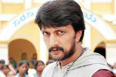 Sudeep supports his guru with a clap