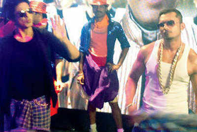 Shah Rukh takes Honey Singh for international tour