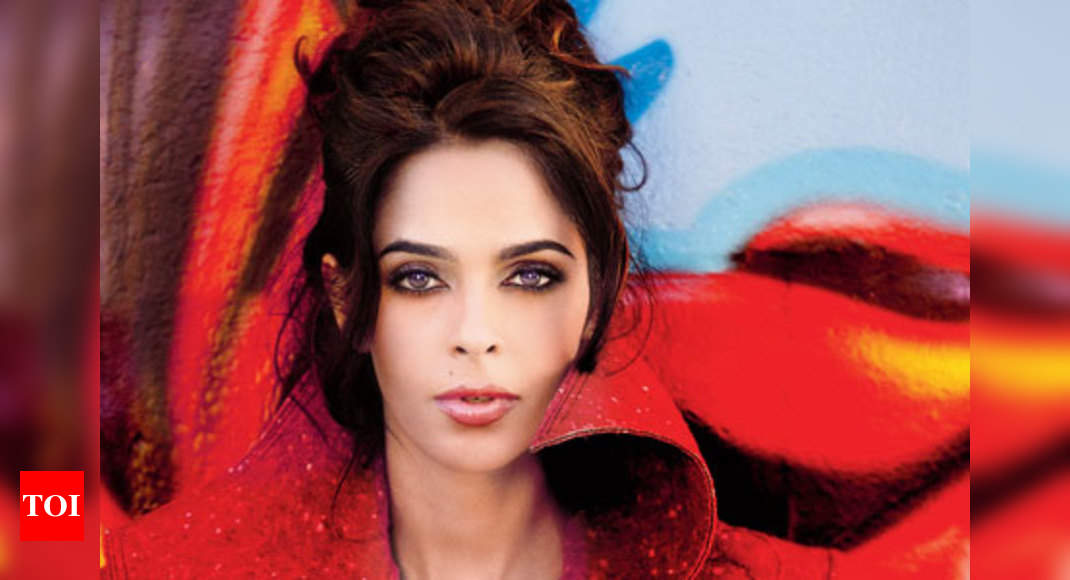 Its difficult for me to get over my fathers betrayal Mallika Sherawat Hindi Movie News photo