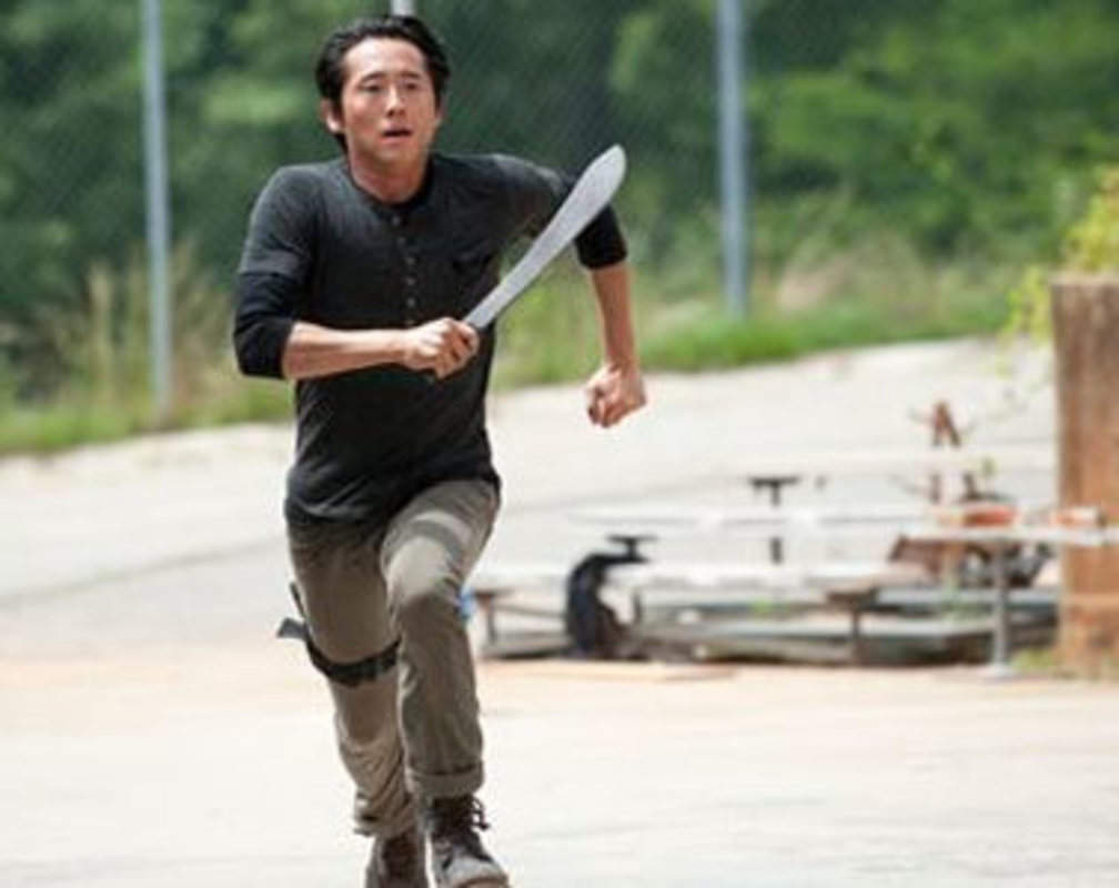 
Yeun explains the new threats for 'Walking Dead' survivors
