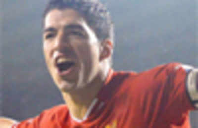 Luis Suarez is as good as Lionel Messi, says Robbie Fowler