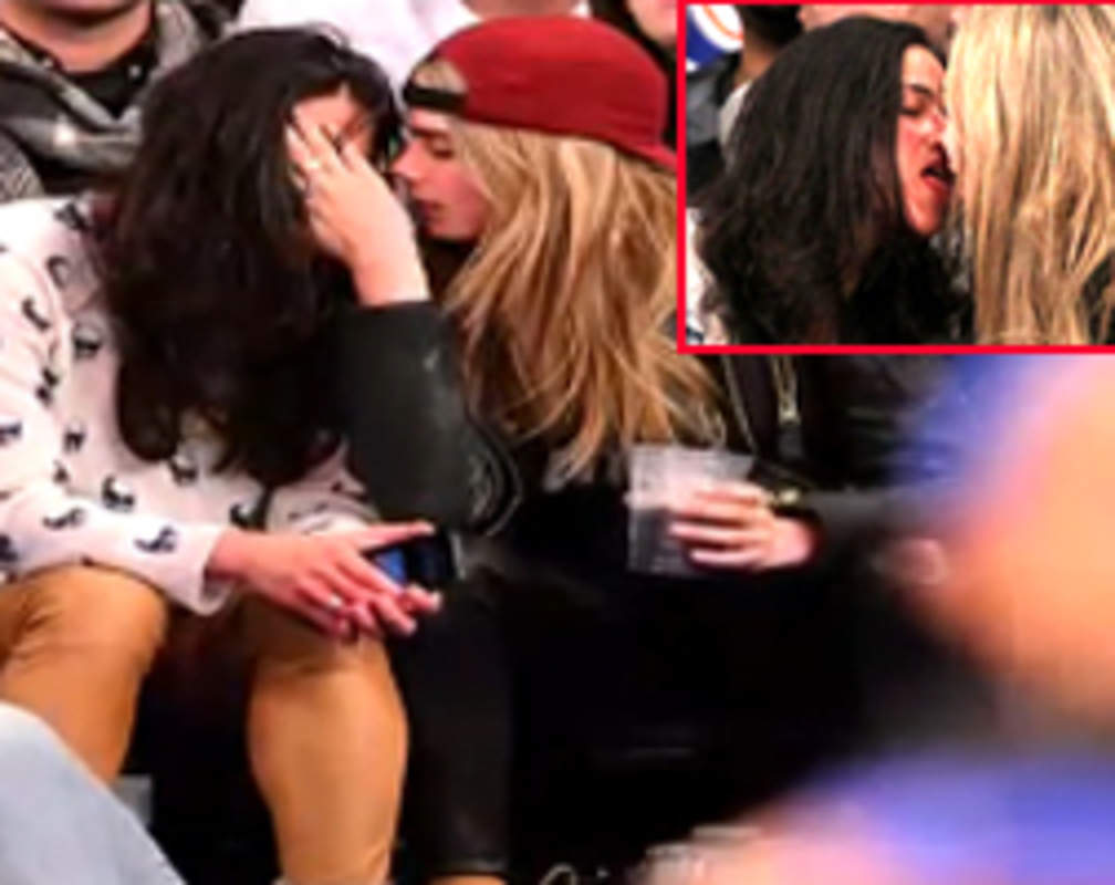 
Cara Delevingne shares sloppy kiss with actress Michelle Rodriguez
