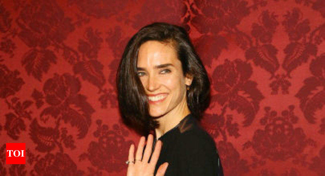 Giggling Jennifer Connelly puts on a sweet display with husband Paul Bettany  at Shelter premiere