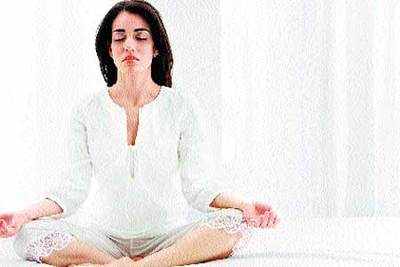 How to use Yoga to prevent Hair loss? | - Times of India