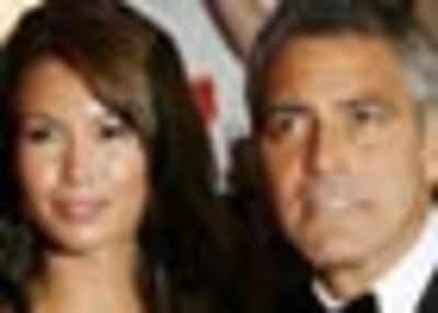 Sarah's 'wild' past behind split with Clooney?