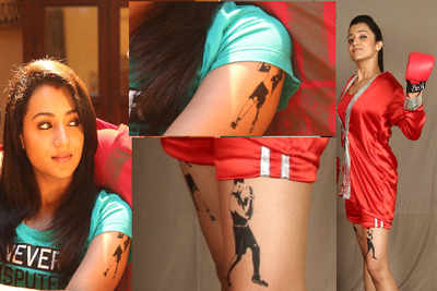 Trisha inks Jayam Ravi on her thighs and arms!