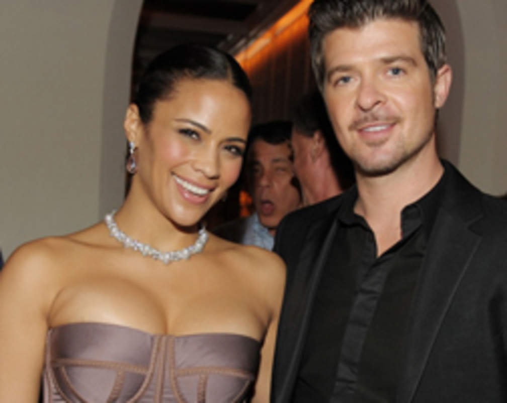 
Miley Cyrus behind Robin Thicke and Paula Patton's split?
