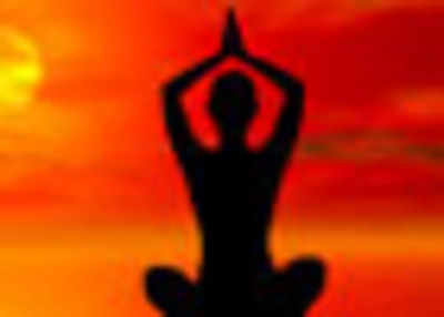 Yoga ignites the divine spark - Times of India