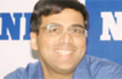 Anand seals Candidates title with effortless draw